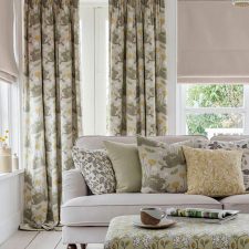 Sage green and yellow matching curtains, cushions and foot stall