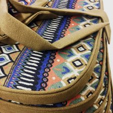 Close up Aztec patterned chair cushion covers