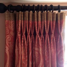 Hessian and red fabric curtains