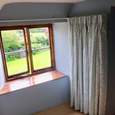 Blue repeated patterned curtains
