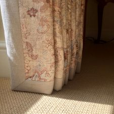 Natural coloured curtains with matching carpet