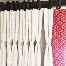 Double pleated ivory curtains