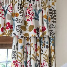 Bright coloured floral patterned curtains