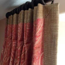 Red and hessian fabric curtains