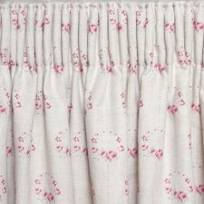 Pleated cream and pink curtains